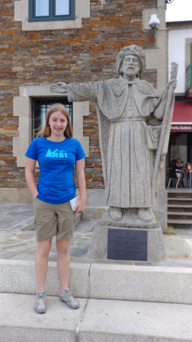 Elizabeth standing next to Pilgrim Statue